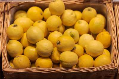 Close-up of fruits in basket for sale at market stall