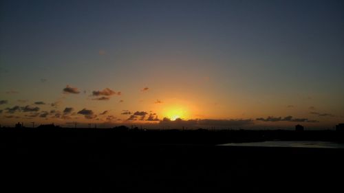 Scenic view of silhouette against sky during sunset