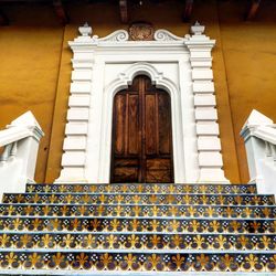 Low angle view of closed window of building