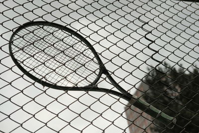 Low angle view of chainlink fence