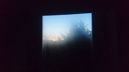 View of sky seen through window