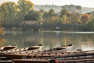 Boats moored in lake