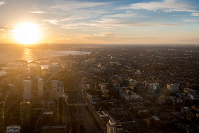 High angle view of cityscape against sky during sunset