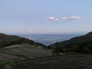 Scenic view of landscape against sky during sunset