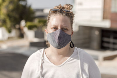 Portrait of woman wearing fabric mask