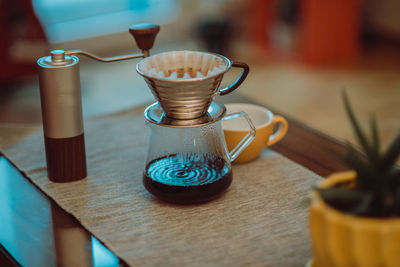 Close-up of coffee cup on table