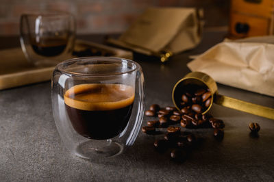 Close-up of coffee cup on table