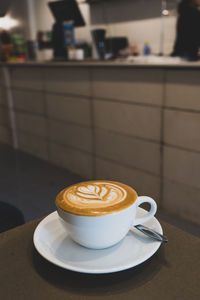 Coffee cup on table