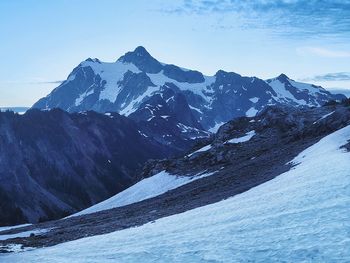 Snowcovered alpine landscape near mount baker at dusk 