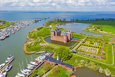 Aerial from the medieval muiderslot castle at the ijsselmeer in the netherlands