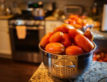 Close-up of fruits in bowl on table