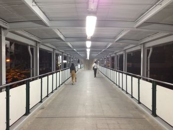 Illuminated corridor of building