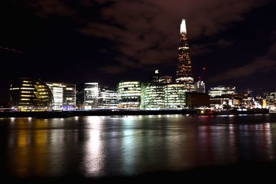 Illuminated buildings in city at night