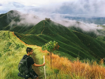 Full length of young man on land