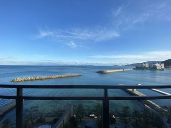 Scenic view of sea against blue sky