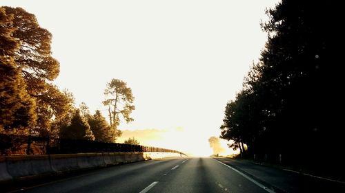 Empty road at sunset