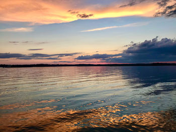 Scenic view of sea against orange sky