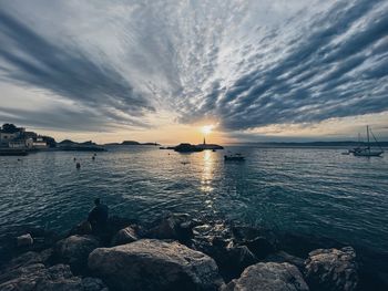 Scenic view of sea against sky during sunset