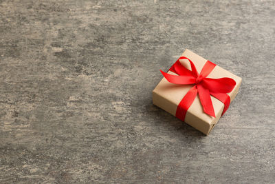 High angle view of gift box on table