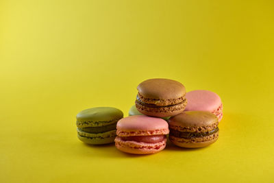 Close-up of dessert against yellow background