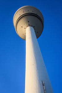 Low angle view of built structure against blue sky