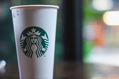 Close-up of coffee cup on table