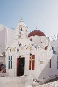 Low angle view of white building against clear sky