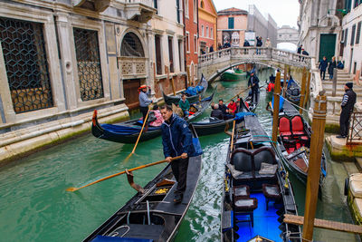 View of canal passing through buildings