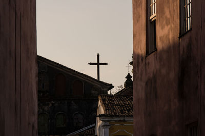 Low angle view of bell tower against sky