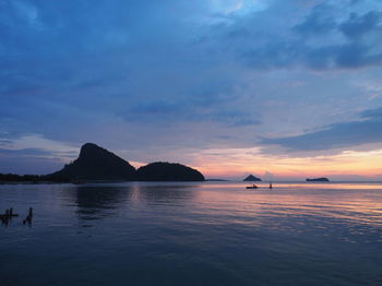 Scenic view of sea against sky at sunset