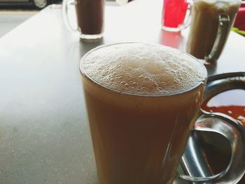 Close-up of coffee cup on table