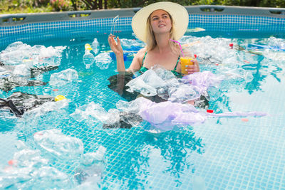 Woman swimming in pool