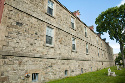 Low angle view of old building against sky