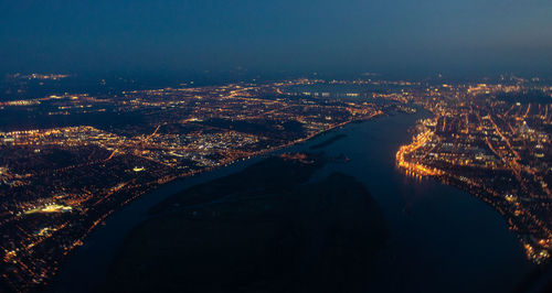 High angle view of illuminated city at night