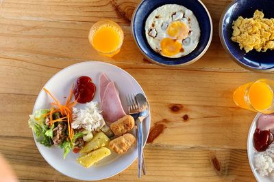 High angle view of breakfast served on table