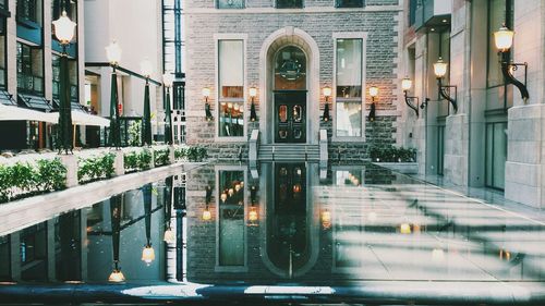 View of illuminated buildings in city