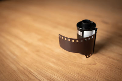 High angle view of camera film on table