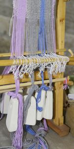 Close-up of clothes hanging on rope