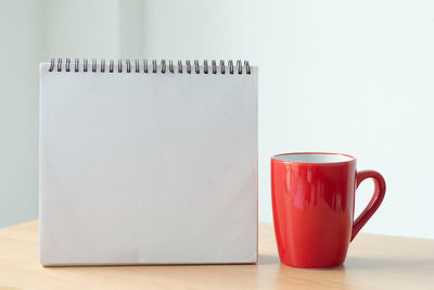 Close-up of coffee cup on table