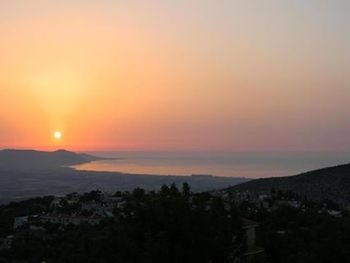 Scenic view of mountains at sunset