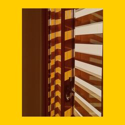 High angle view of yellow table against wall at home