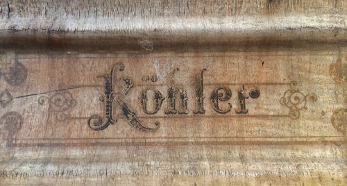 Close-up of text on wood