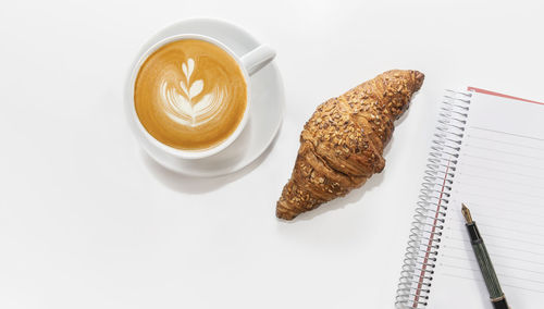 High angle view of coffee on white background