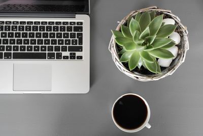 Directly above view of coffee cup on table