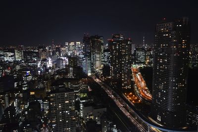 Illuminated cityscape at night