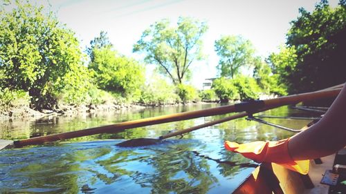 Low section of people relaxing on canal