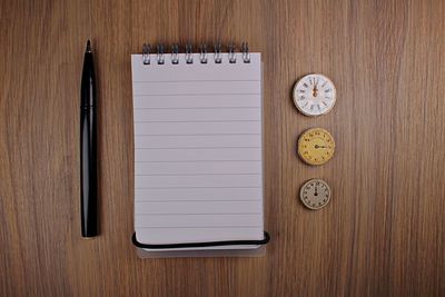 Close-up of clock on table