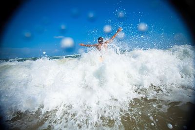 Man surfing in sea