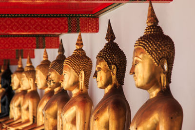 Buddha statues in row at temple