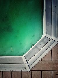 High angle view of algae growing in swimming pool